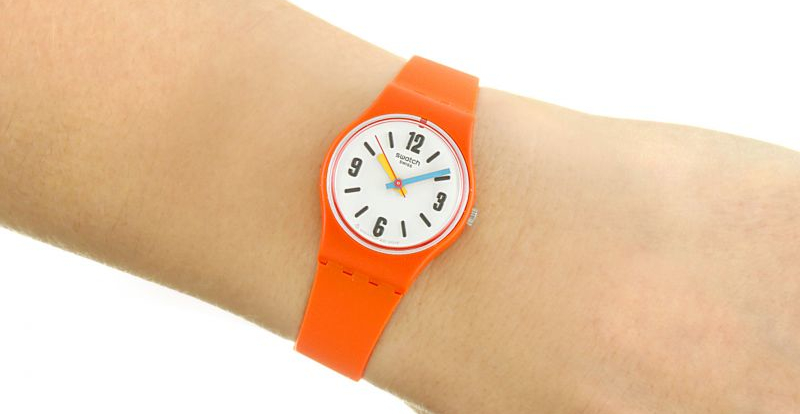 Swatch Orange on wrist
