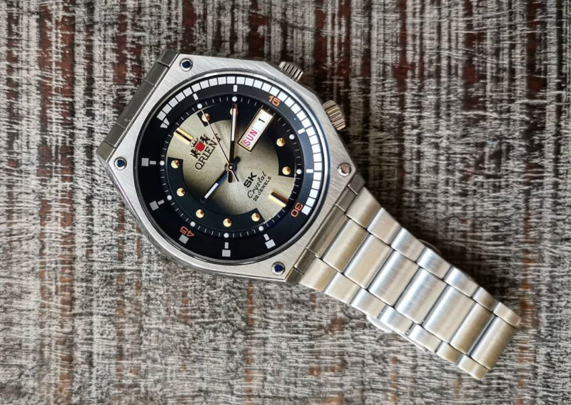 Orient SK Diver Retro Champagne dial laying on table